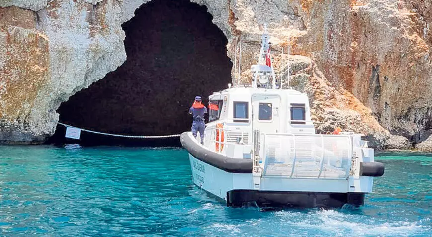 Two caves chained to protect monk seals